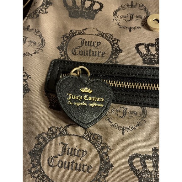 A Juicy Couture tan And Black Medium Backpack With Crown And Key. Fold Over Top - Picture 13 of 13